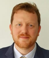 Geoffrey-passport-photo-- Geoffrey-passport-photo--